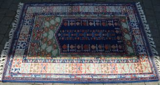 Blue ground Persian rug 183cm x 130cm