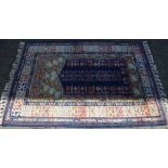 Blue ground Persian rug 183cm x 130cm