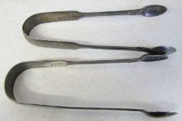 2 silver sugar tongs London 1850 and 1857 weight 2.