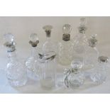 9 silver topped glass decanters (small) and bottles inc Birmingham 1989,