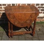 Carved oak gateleg table