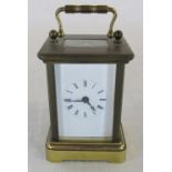 Miniature brass carriage clock H 8 cm (excluding handle)