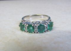 18ct white gold (Italy) diamond and emerald ring size M total carat size emerald 1 ct, diamond 0.