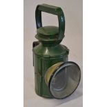 Green painted railway hand lamp with interior burner marked 'BR LMR'