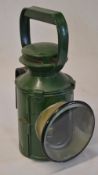 Green painted railway hand lamp with interior burner marked 'BR LMR'