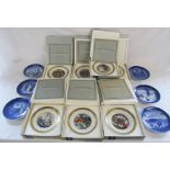 7 boxed Royal Copenhagen Hans Christian Anderson cabinet plates & Royal Copenhagen Christmas plates