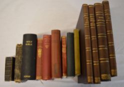 Various books including bibles and Charles Dickens