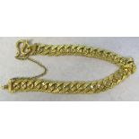 Tested as a minimum of 18ct gold Asian curb bracelet with safety chain weight 31.5 g L 7.