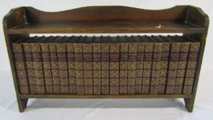 The Rochester Edition of Charles Dickens novels by The Home Library Book Company in wooden bookcase