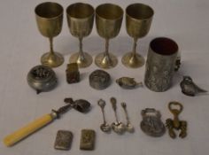 Various white metal including vesta cases, 2 silver tea spoons, animal shaped salts,