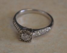 9ct white gold diamond cluster ring with shoulders, approx 0.