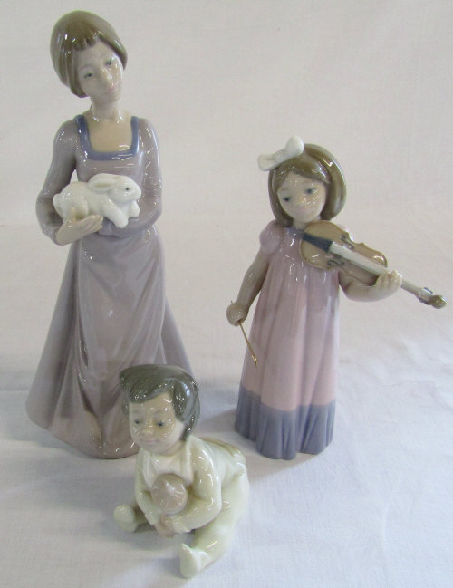 3 Nao figurines - girl with violin,