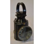 LMS black railway hand lamp, with small brass plate marked 'L.M.