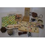 2 fishing reels, cigarette cards, snakes & ladders board, microscope, vintage fuel gauge, camera,