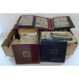 2 large boxes containing 2 albums of stamps,