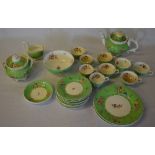 Green & white floral decorated part tea service (AF)