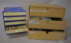 2 sets of watchmakers drawers including stems, staffs,