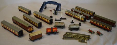 10 Hornby carriages (one damaged) oil tankers including Esso & Shell, bridge,