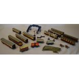 10 Hornby carriages (one damaged) oil tankers including Esso & Shell, bridge,