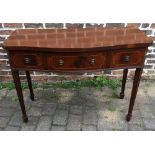 Regency style bow fronted sideboard on tapering legs with spade feet