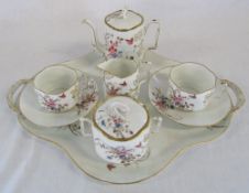 Cabaret tea service comprising of teapot, sugar bowl, jug,