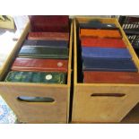 2 boxes containing 12 empty cigarette card albums with sleeves