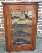 Georgian mahogany glass fronted corner cupboard with dental coarse to pelmet,