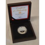 Boxed birth of Prince George silver commemorative coin.