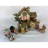 Pendelfin cottage with 7 figures (some with damage) & 3 miniature character jugs including Royal