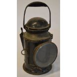 Black railway hand lamp with faded BR mark to the reverse