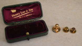 2 9ct gold studs and a yellow metal stud, total approx weight 2.
