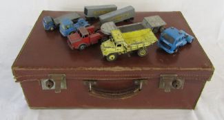 Small suitcase containing playworn die cast cars inc Dinky