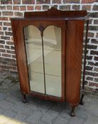 1930s display cabinet with quarter veneer and ball and claw feet