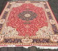 Red ground Keshan carpet 2.8m by 2.