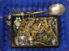 Various costume jewellery, spoon,