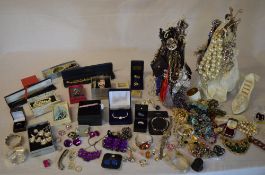 Large quantity of costume jewellery including stands
