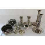Selection of silver plate inc candlesticks and wine coasters