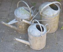 3 galvanized watering cans