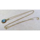 15ct gold necklace with 9ct pendant with blue gemstone