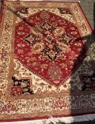 Red ground Heriz carpet 2.30m by 1.