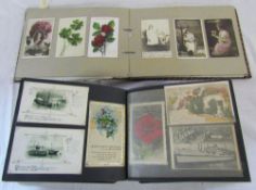 2 vintage postcard albums containing assorted greeting cards