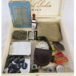 Box of assorted items inc Roger Lascelles travel clock, buttons, racing badges,