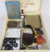 Box of assorted items inc Roger Lascelles travel clock, buttons, racing badges,