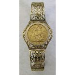9ct gold ornate pierced bracelet set with a mounted 22ct gold Edward VII 1906 full sovereign with