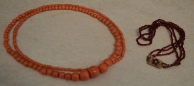 Coral style beaded necklace and another beaded choker with yellow metal clasp