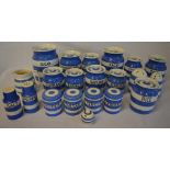 Large quantity of T G Green cornishware kitchen storage jars including ground rice, sago, tartar,