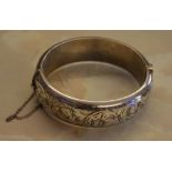 Silver decorated bangle with safety chain, Chester 1958, Smith,