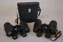 2 pairs of binoculars,