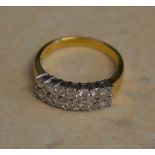 18ct gold dual row diamond ring with central diamond accent stones, approx 1ct of diamonds total,