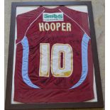 Framed Scunthorpe United signed football shirt,